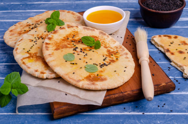 istock Traditional flatbread with oil, sesame and mint 1267131843