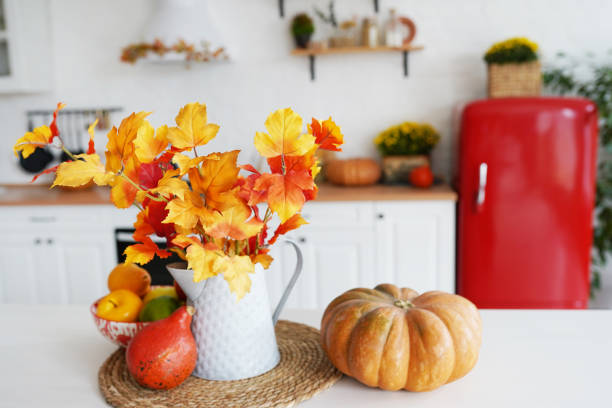 istock Autumn kitchen decoration with pumpkins, loft style kitchen decorated for Halloween or Thanksgiving 1267133201