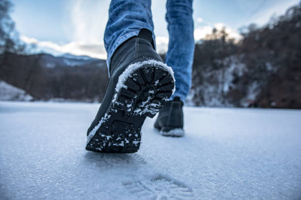 istock man walking in the winter park 1267134074