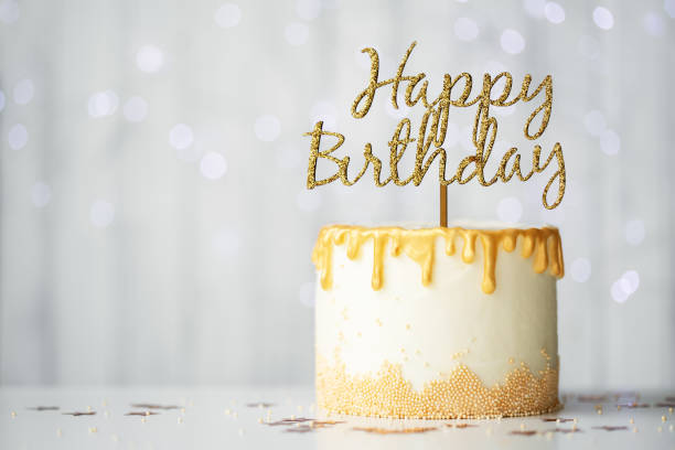 istock Golden birthday cake 1267134294