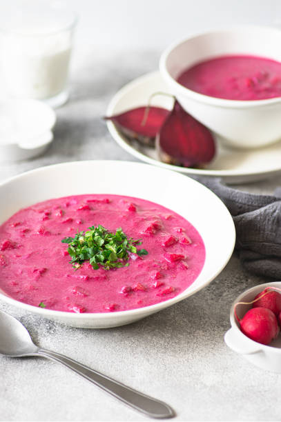 istock Beetroot gazpacho soup, refreshing summer vegan soup served on a white table with radishes, herbs, sour cream and ice 1267134800