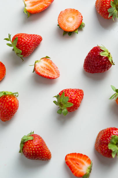 istock Close up of ripe strawberry on white table 1267137352