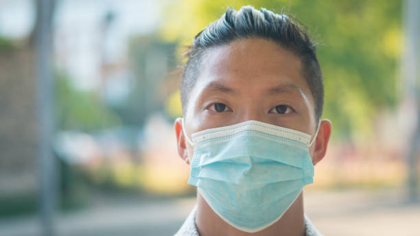 istock Man In Mask Walks Outside 1267137439