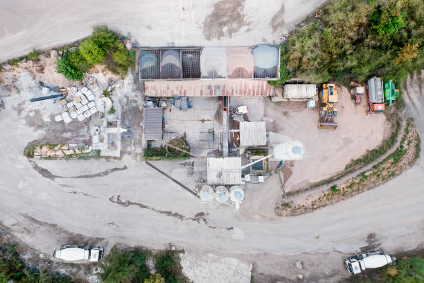 istock Sand and gravel open pit mining - aerial view 1267141121