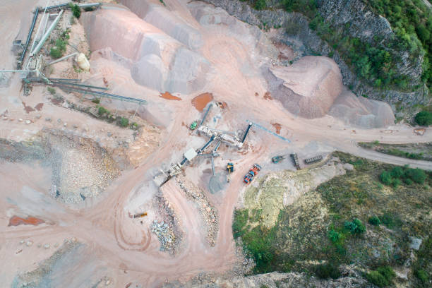 istock Sand and gravel open pit mining - aerial view 1267141132