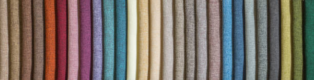 Various samples multicolored natural fabric background. Wide selection textiles. Long banner.