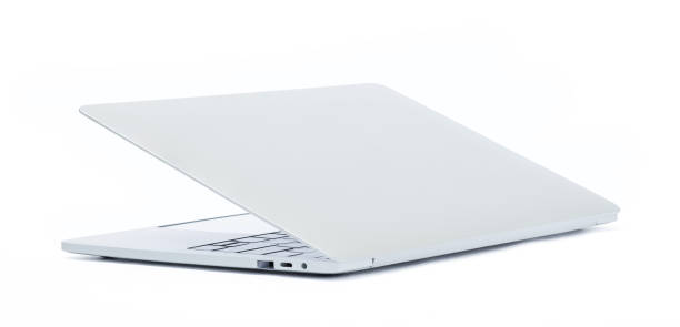istock Back view of silver laptop computer isolated on white background 1267141627