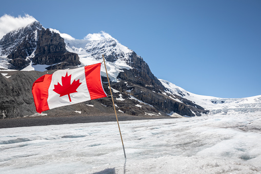 Canadian Flag at Columbia Icefield in Jasper National Park, Canada