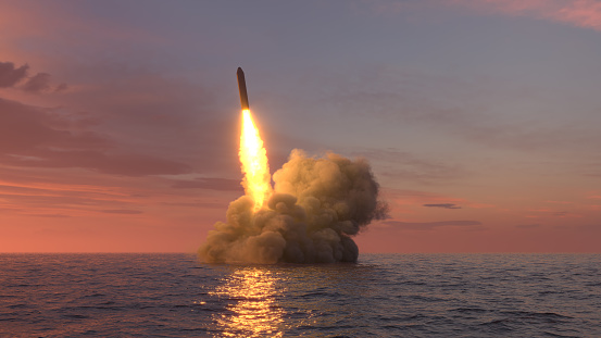 Ballistic missile launch from underwater at sunset 3d illustration