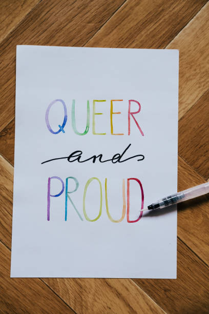 istock queer and pround handwritten with watercolor 1267148312