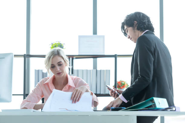 istock Business partners training and discussing contract and graph of financial report development, new project investment business job. Team work partners meeting and brief work in the office room.  Business Concept 1267148365
