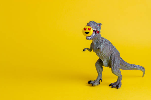 istock Dinosaur on a yellow background. Toy. Creative idea. Concept. 1267152926