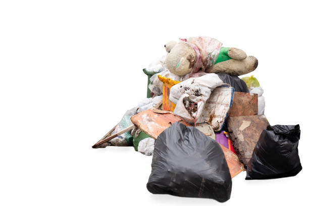 istock Teddy bear on the garbage pile isolated in white background. 1267152949
