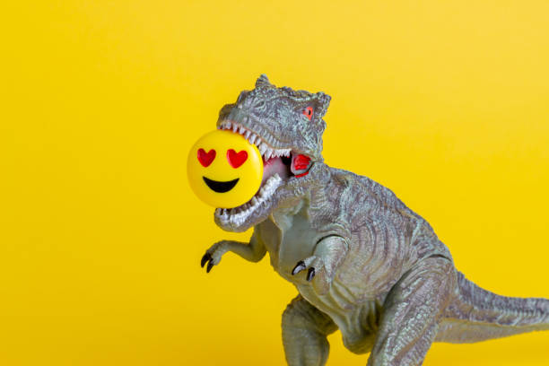 istock Dinosaur on a yellow background. Toy. Creative idea. Concept. 1267153773