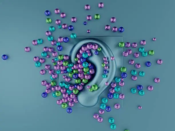 Multicolored orbeez balls scattered on a ASMR microphone. Autonomous Sensory Meridian Response. Relaxing sound concept. 3d illustration