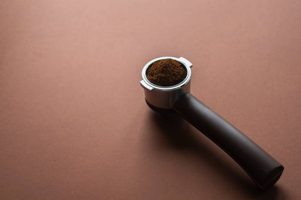 istock Portafilter coffee machine holder with ground beans 1267160878