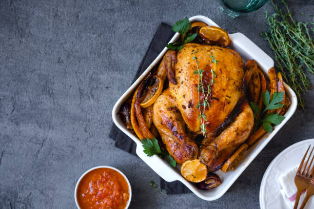 istock Thanksgiving celebration traditional dinner setting meal concept. Thanksgiving dinner with chicken. Flat lay. Banner. Top view 1267161193