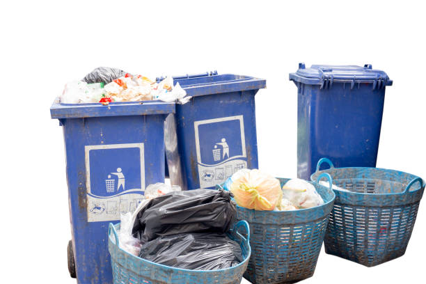 istock Full bins waste plastic bags isolated in white background. 1267162423