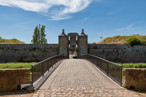 Bridge leading to the Porte de Neptune of the Citadel of Calais, a fortress that was initially constructed in the 16th century with the purpose to defend the city of Calais.