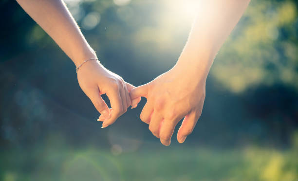 istock couple in love hand in hand 1267165219