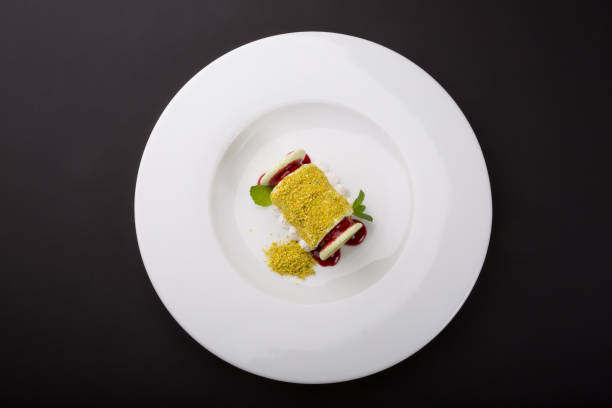 istock Pistachio italian dessert on white plate 1267165498