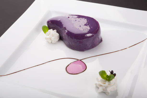istock Sweet dessert cake with violet icing 1267165650