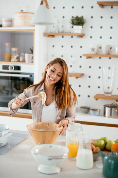 istock Young women in kitchen stock photo 1267165801