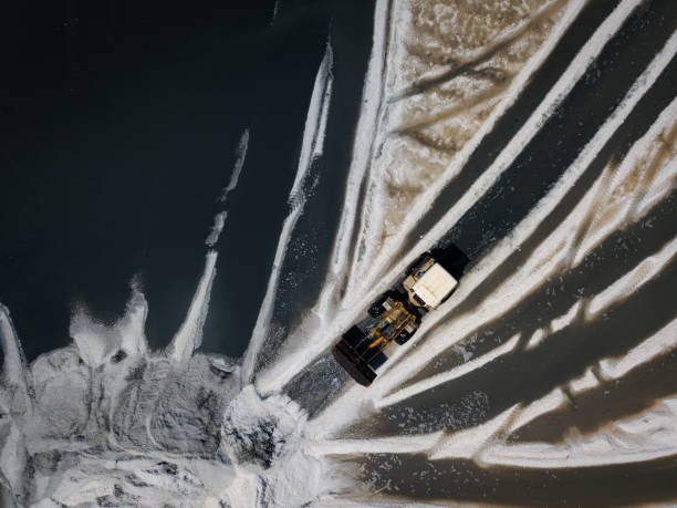 istock Bulldozer is pushing a large quantities of soil and sand 1267166025