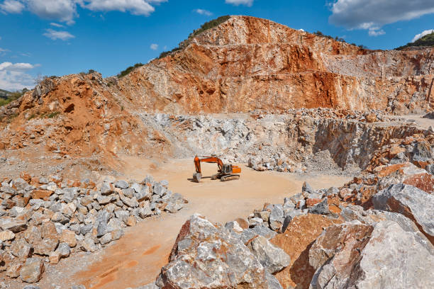 istock Heavy excavator on a quarry. Excavation machinery. Earthmover work 1267166136