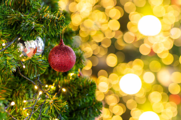 istock Beautiful Christmas tree with decor against blurred bokeh lights in background. 1267166201