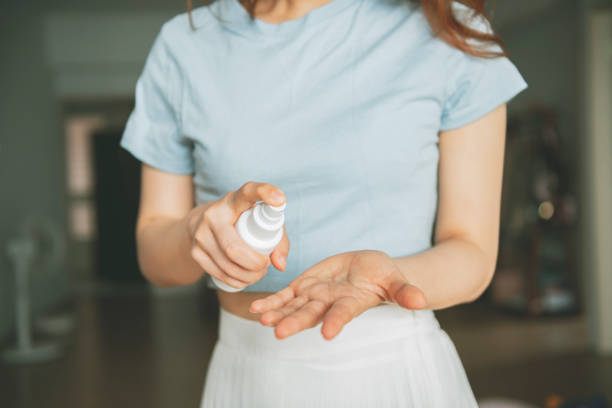 istock Girls disinfect with alcohol 1267167151