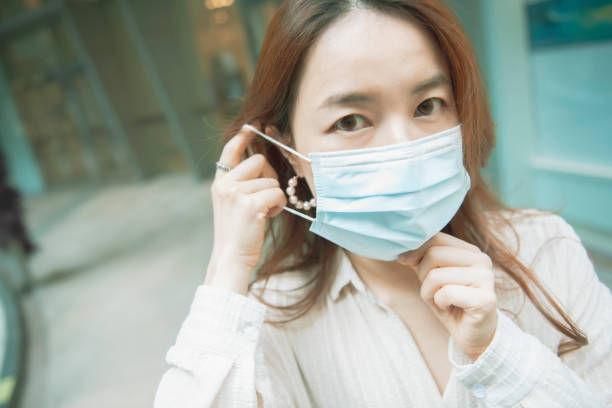 istock Asian girls wear masks 1267167241