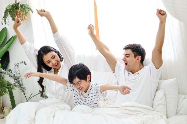 istock Happiness young couple lover sleeping and relaxation on bedroom. 1267167357