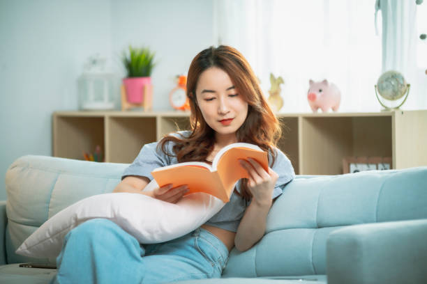 istock Female Student Sitting On Living Room 1267169867