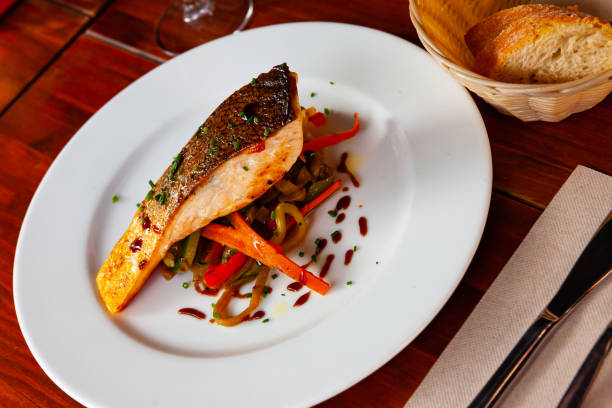 istock Grilled salmon with sauteed veggies 1267172060