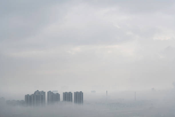 istock Office buildings covering with fog 1267173259