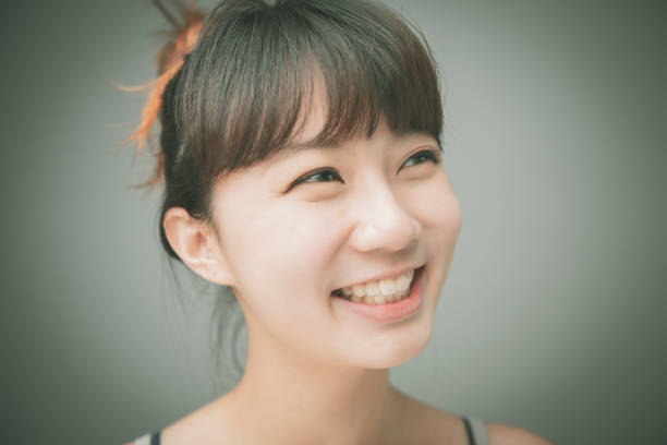istock Young Woman Looking At Camera 1267173275