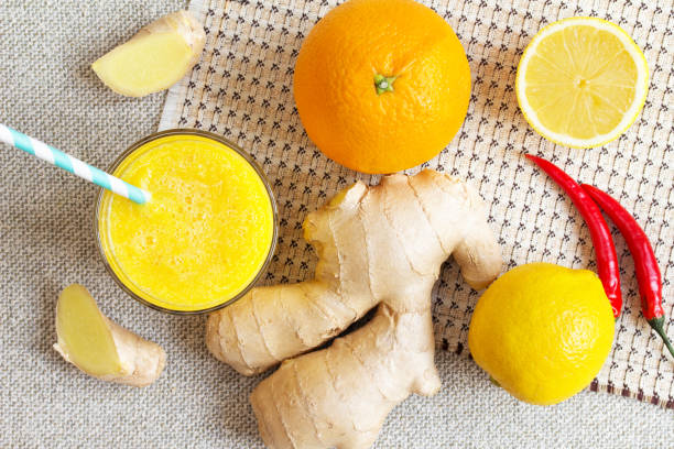 istock Orange, lemon, ginger warming smoothies. Vegan energy smoothie. 1267175846