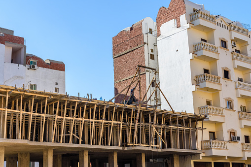 Construction of new modern residential building, wooden framework. Hurghada, Egypt
