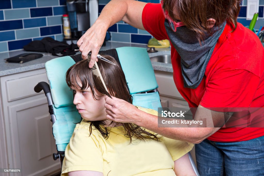 Autistic Girl In Wheelchair Gets Hair Cut At Home During Covid19 Quarantine Stock Photo - Download Image Now - iStock Autistic Girl In Wheelchair Gets Hair Cut At Home During Covid19 Quarantine Stock Photo - Download Image Now - iStock