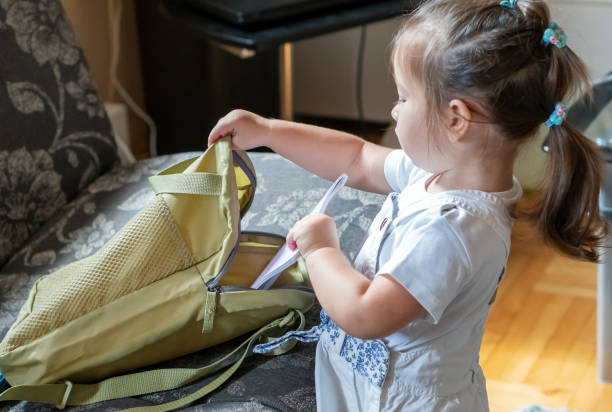 istock Little girl preparing for preschool 1267185165