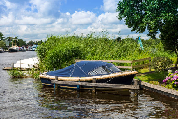 istock Landscaped dinghy on the jetty 1267185177