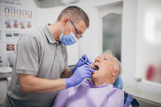 istock Senior male at the dentist 1267186095