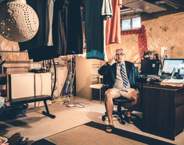 istock Mature man at work in his basement office 1267186325
