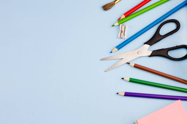 istock Office supplies on a blue background. 1267189377