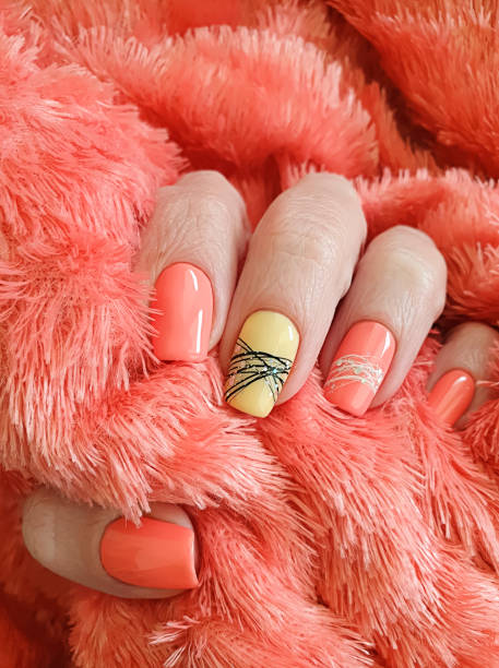 istock female hand beautiful colored manicure 1267189926