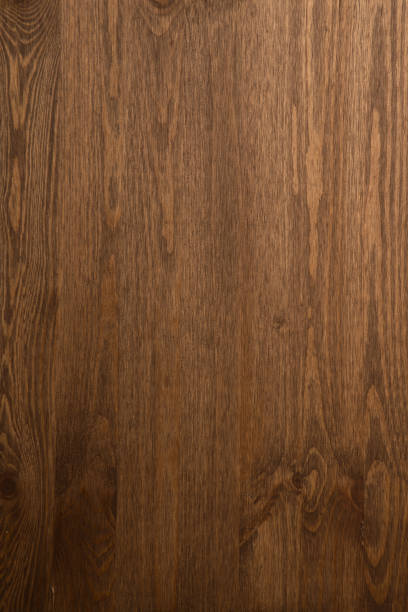 istock Dark Brown wood plank wall texture background 1267190698