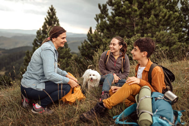 istock Happy family spending leisure time during hiking tour 1267190897