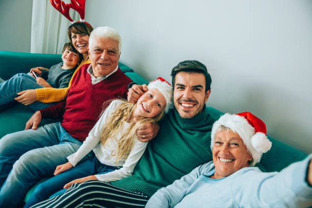 istock Multi-generational family taking selfie on Christmas 1267194627