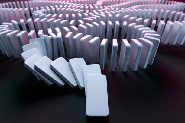 white domino pieces pushing the domino effect. concept starting or triggering process and dependence from each other. chain reaction. 3d rendering - dominó imagens e fotografias de stock